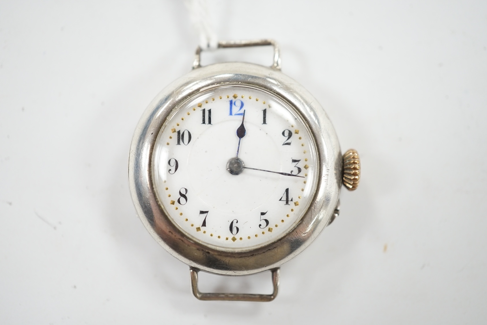 A George V silver manual wind wrist watch, with Arabic dial, no strap. Condition - poor